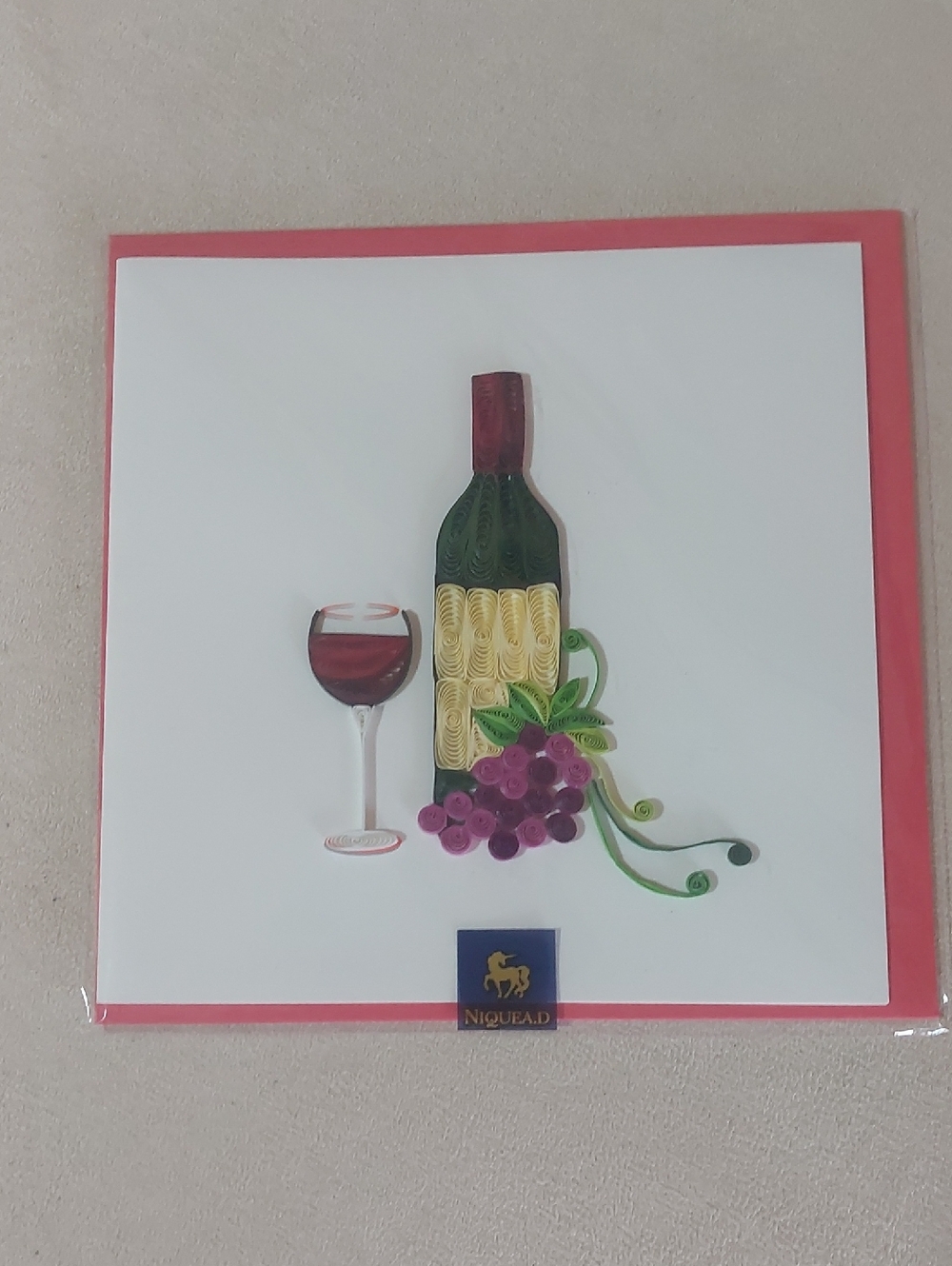 Niquea.D Red and White Birthday Card with Unicorn Logo
